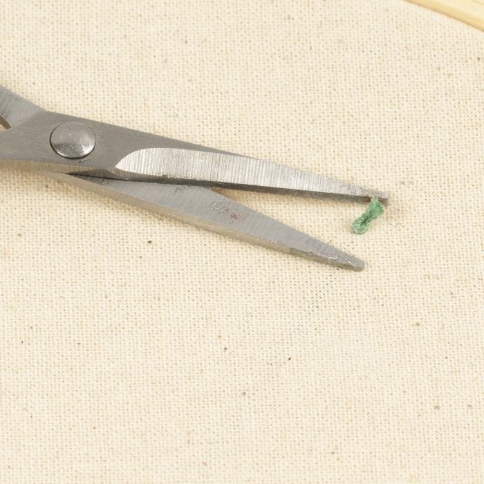 Comment tisser les extrémités lors d'un travail de broderie