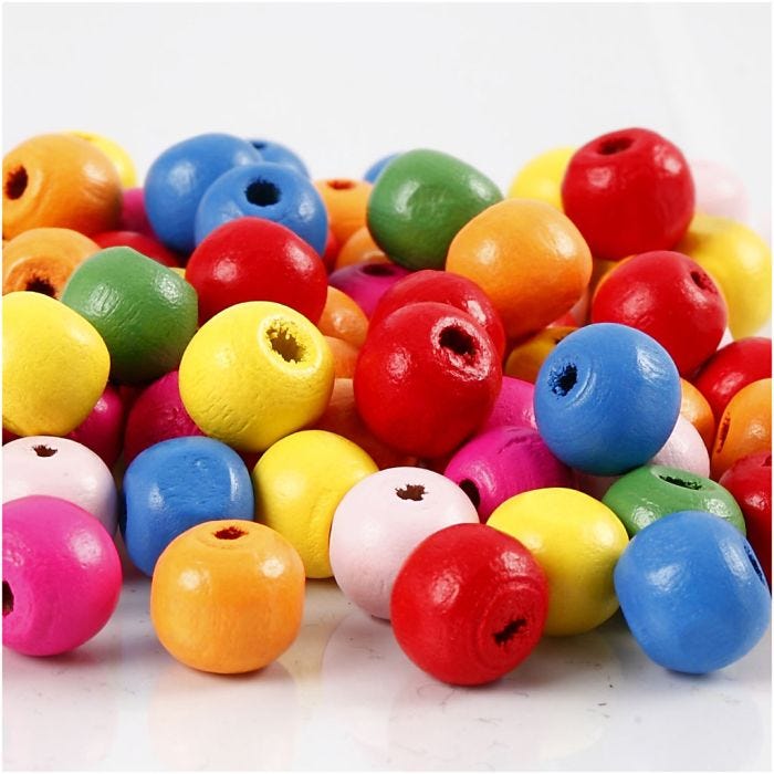 Perles en bois, d 10 mm, diamètre intérieur 2,5-3 mm, ass. de couleurs, 500 gr/ 1 sac