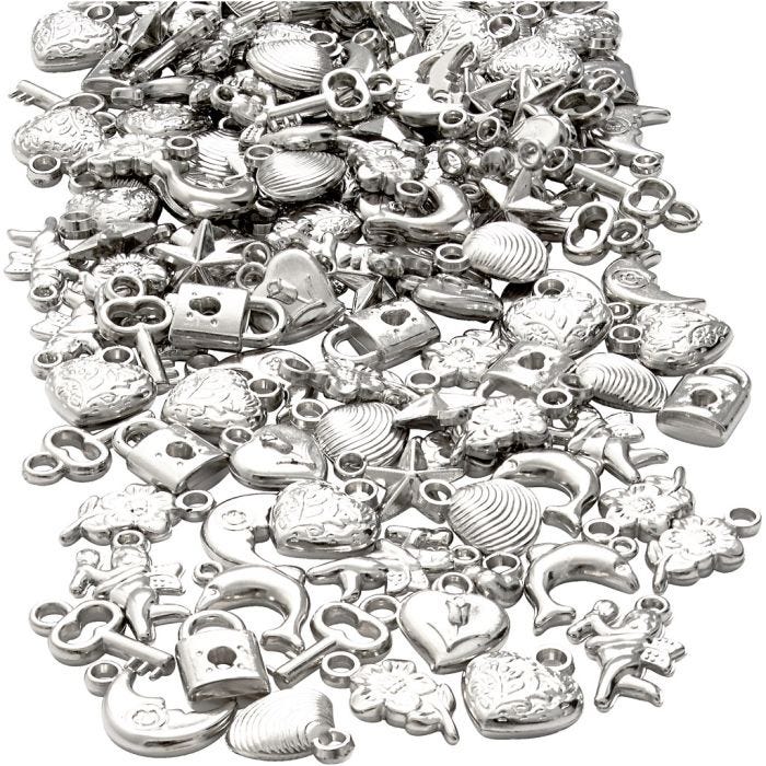 Zilveren bedels, afm 15-20 mm, gatgrootte 3 mm, 80 gr/ 1 doos