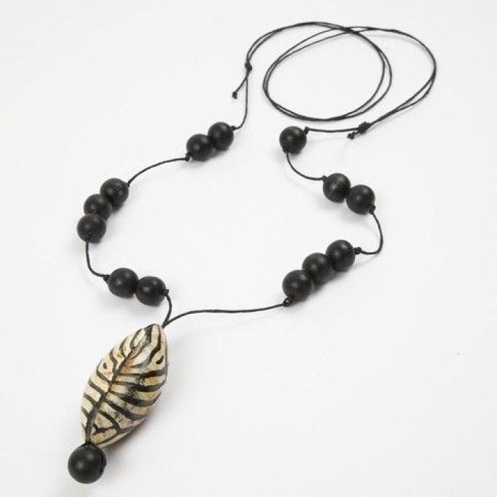 A Necklace with a Buffalo Horn Bead