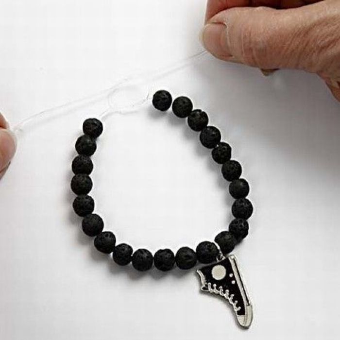 A bracelet made from beads and a charm