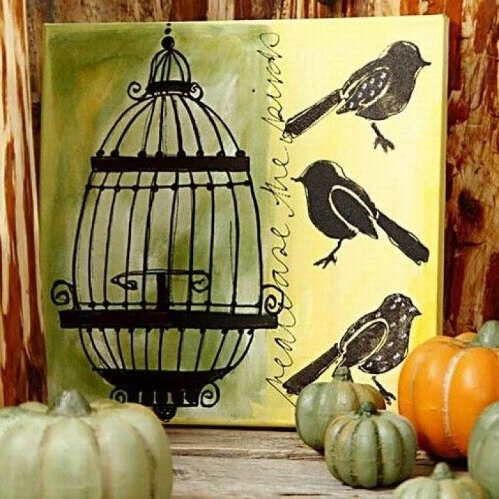 Art Canvas met vogels en een kooi