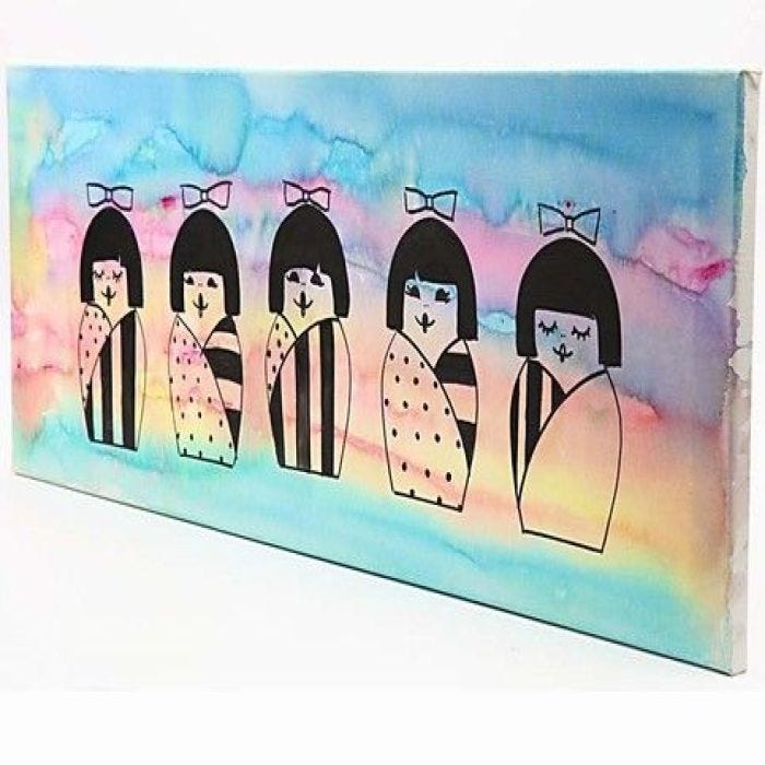 Une peinture avec des poupées japonaises de Kokeshi