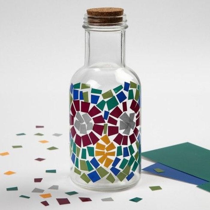 A Glass Bottle decorated with Color Decor