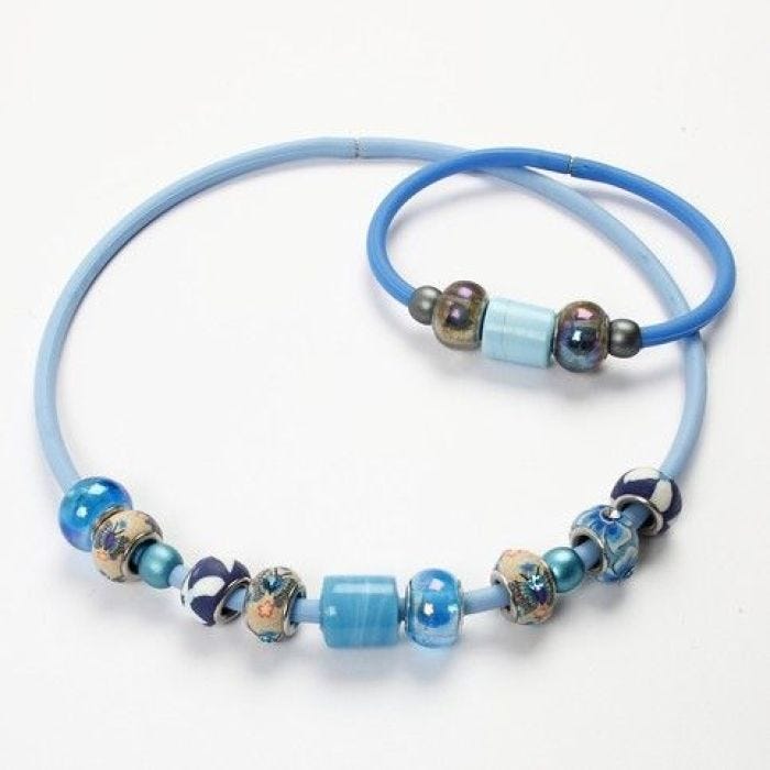 A Rubber Necklace with Glass Beads and Clay Beads