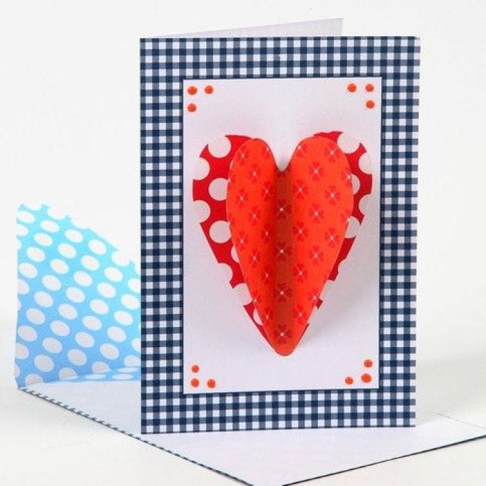 Une carte de voeux avec un coeur en 3D