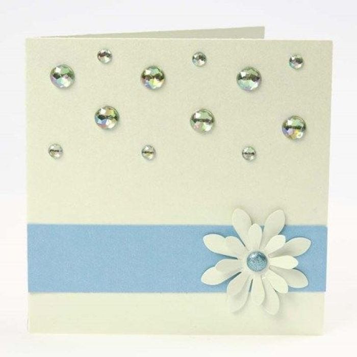 A Greeting Card with a Border, a Punched-Out Flower and Rhinestones