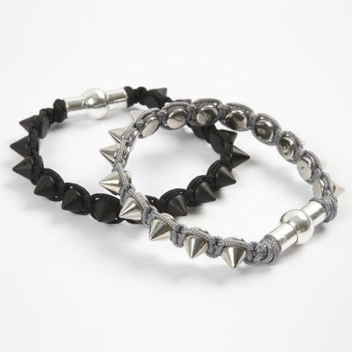 Gevlochten armband met metalen studs