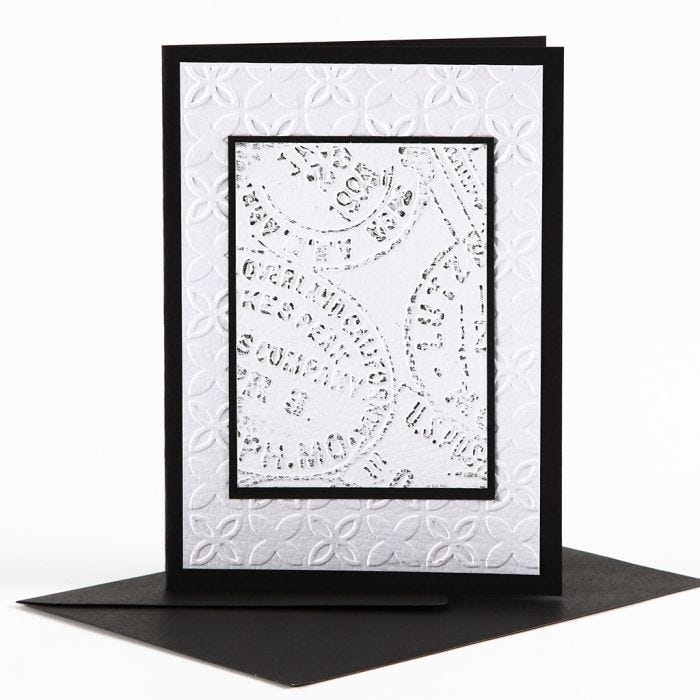 A Greeting Card with embossed Decoration and Wax Crayons