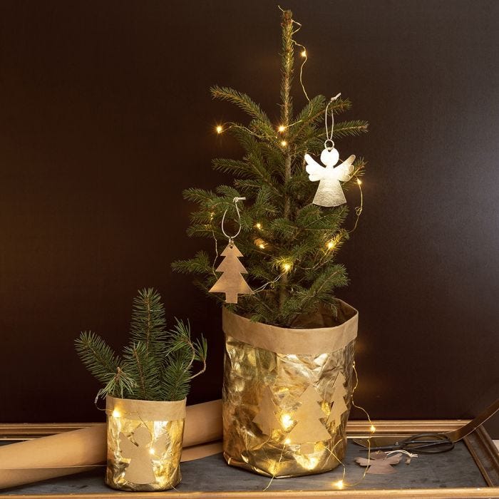 A Flower Pot covered with Faux Leather Paper decorated with Christmas Designs