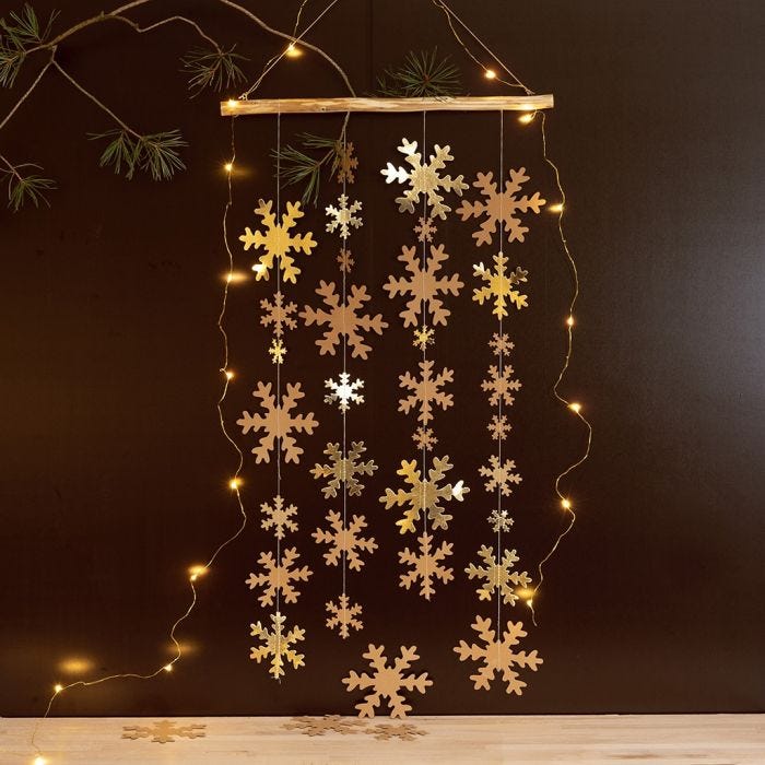 A hanging Decoration with Faux Leather Paper Snowflakes