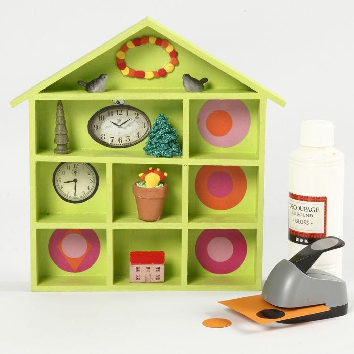 A House-shaped Shelving System decorated with Craft Paint and Collage