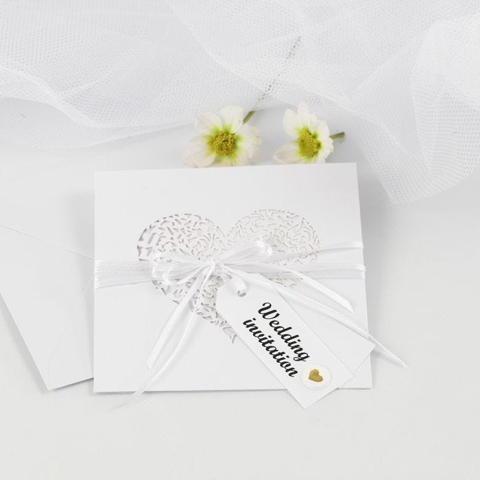 A Wedding Invitation with Satin Ribbon and Manilla Tags decorated with Puffy Stickers