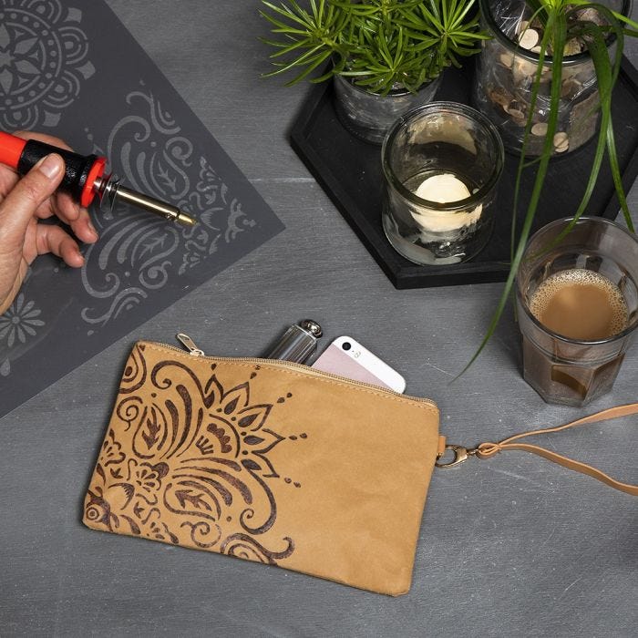 A Faux Leather Paper Clutch decorated with an Ethnic Design using a Pyrography Tool