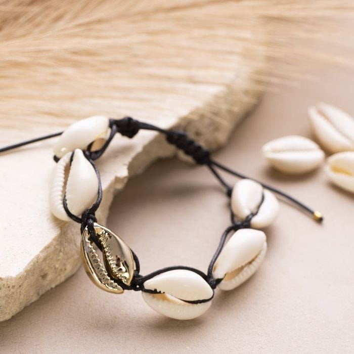 A braided Bracelet or Ankle Chain with Sea Shells