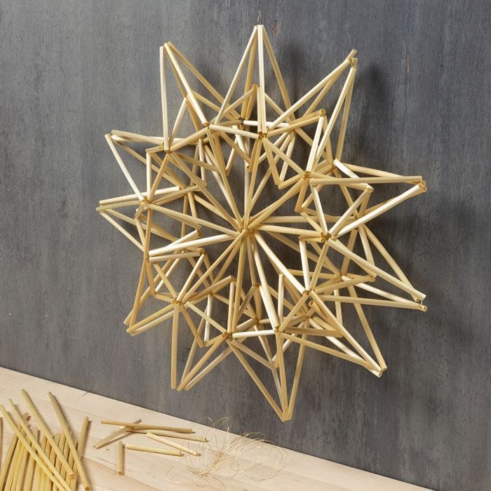 A large Straw Star hanging Decoration