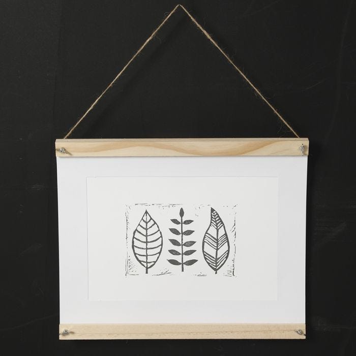 A homemade stamp printed leaf design on paper