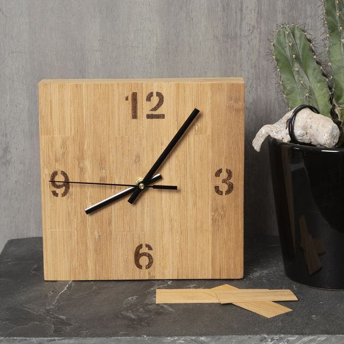 A clock box decorated with bamboo veneer