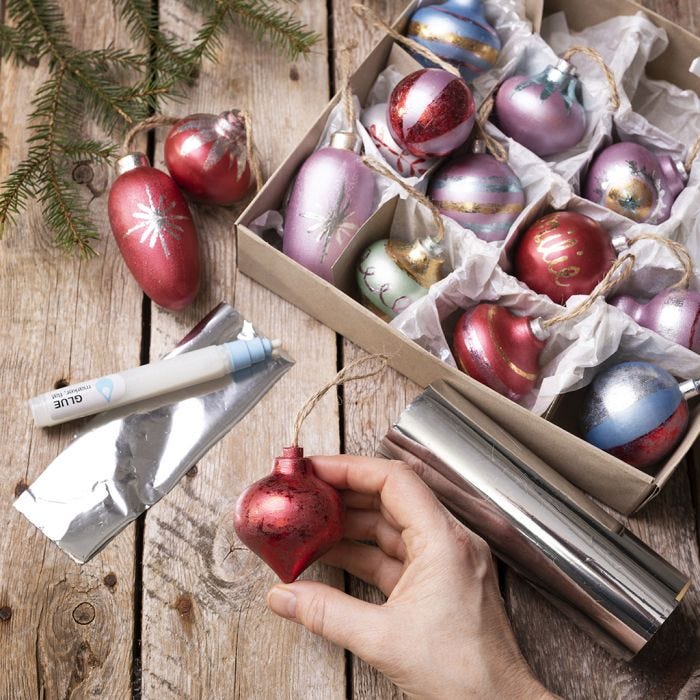 Wooden Christmas baubles decorated with Art Metal paint and deco foil