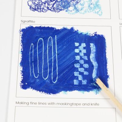 Zo maakt u een sgraffito-effect met oliepastel