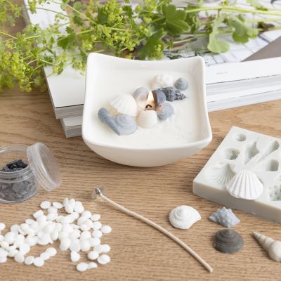 Bougeoir avec coquillages de plage