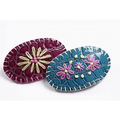 Haarspelden van slangenhuid