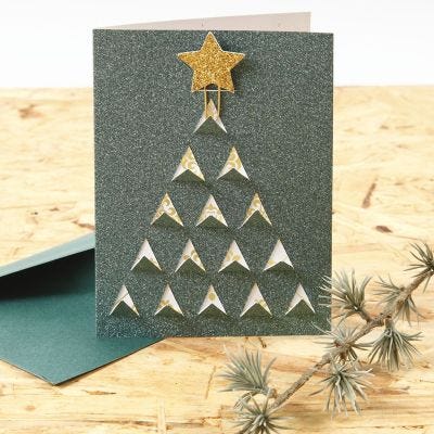 Un carte de Noël décorée sur le recto