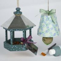 Decorated flowerpot and bird table for bird food for the winter